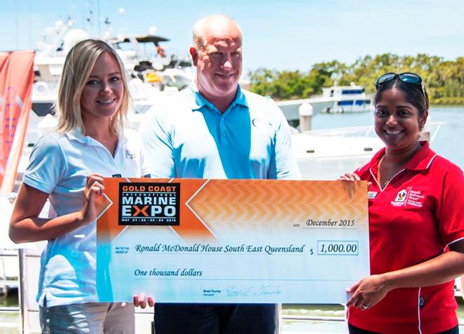 Emma Brown and Brett Thurley present a $1000 donation to Preshni Pillay from Ronald McDonald House Charities – South East Queensland on behalf of the Gold Coast International Marine Expo © Gold Coast Marine Expo www.gcmarineexpo.com.au